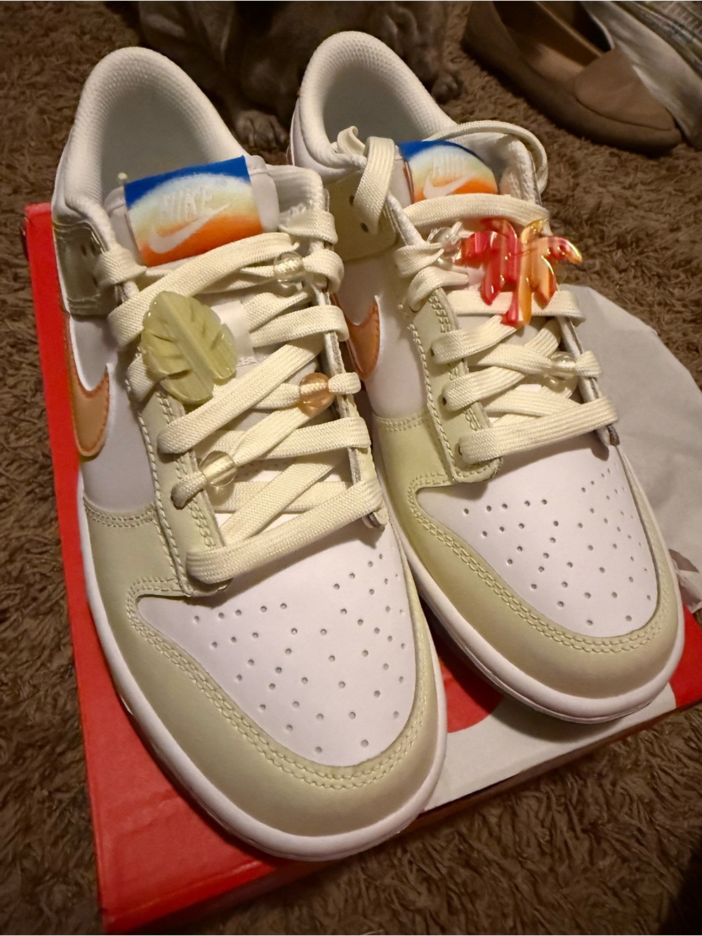 Nike Kids Low-Top Sneakers in Cream with Orange Swoosh